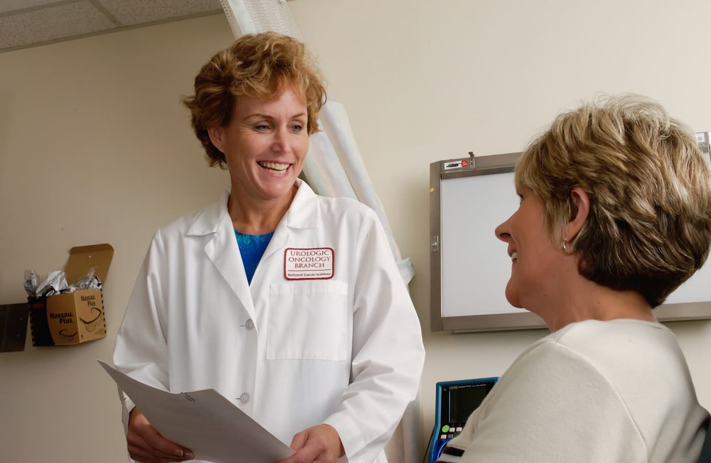 A caring doctor speaking with a patient